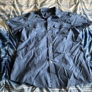 Men’s size medium casual button down shirt.